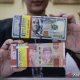 Rupiah Melemah Terhadap Dolar AS: Faktor Utama dan Dampaknya