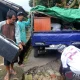 Warga Tegal Menukar Uang Rp 1,54 Miliar yang Rusak Akibat Banjir Rob