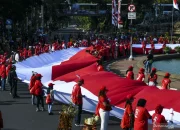 Pengibaran Bendera Merah Putih di Bulan Kemerdekaan: Antara Tradisi dan Makna