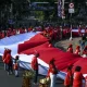 Pengibaran Bendera Merah Putih di Bulan Kemerdekaan: Antara Tradisi dan Makna